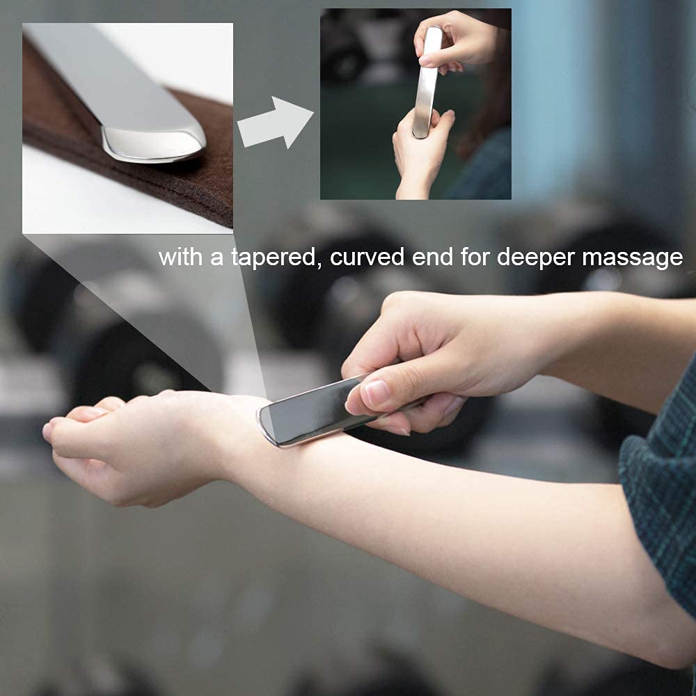 Allshow gua sha tool in use on back demonstrating muscle tension relief.