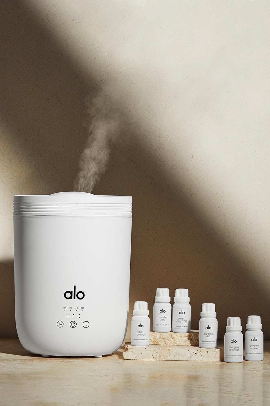 Alo Aura Diffuser room setup shown in living area for workouts.