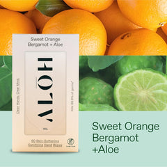 ALO Sweet Orange Bergamot Aloe wipes in hand for quick clean