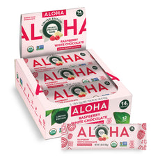 ALOHA Raspberry White Chocolate bar on wood surface, a vegan, gluten-free snack option.