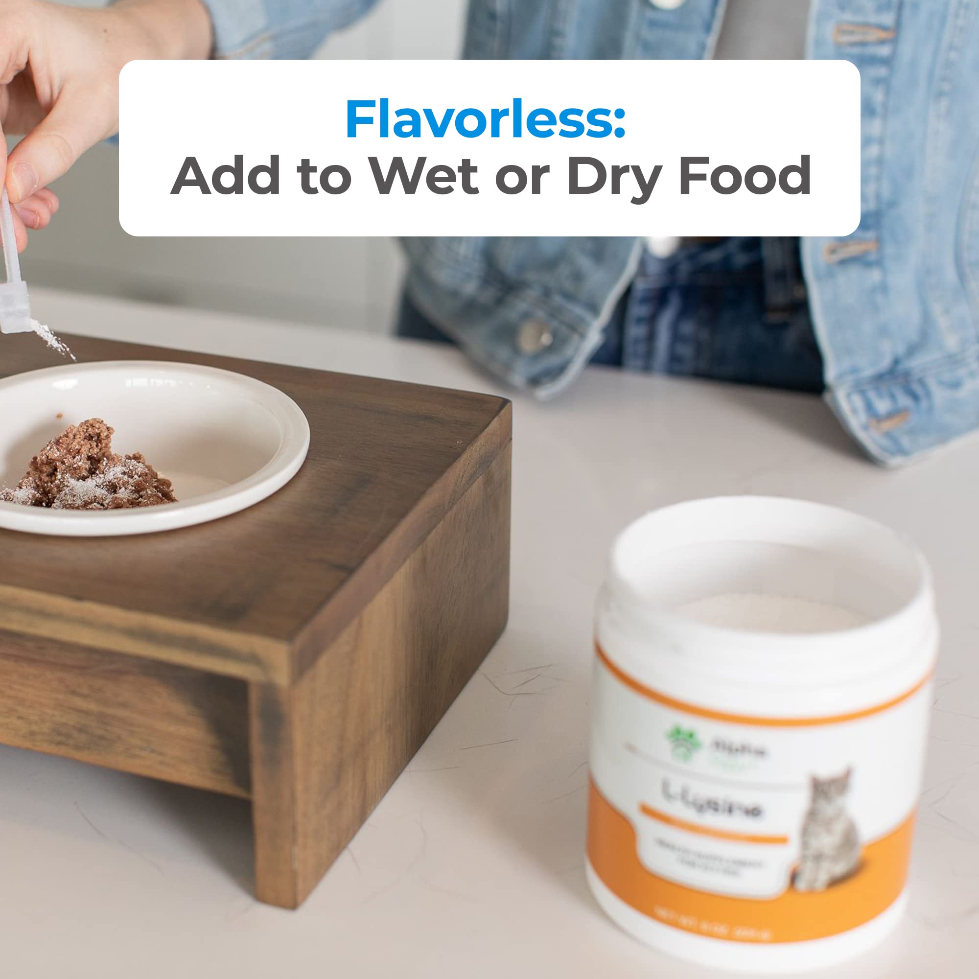 Alpha Paw lysine powder sprinkled on cat food for seamless supplementation.