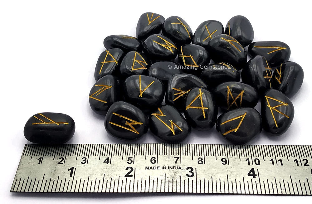 Amazing Gemstone close-up shows fine engraving on a black agate rune