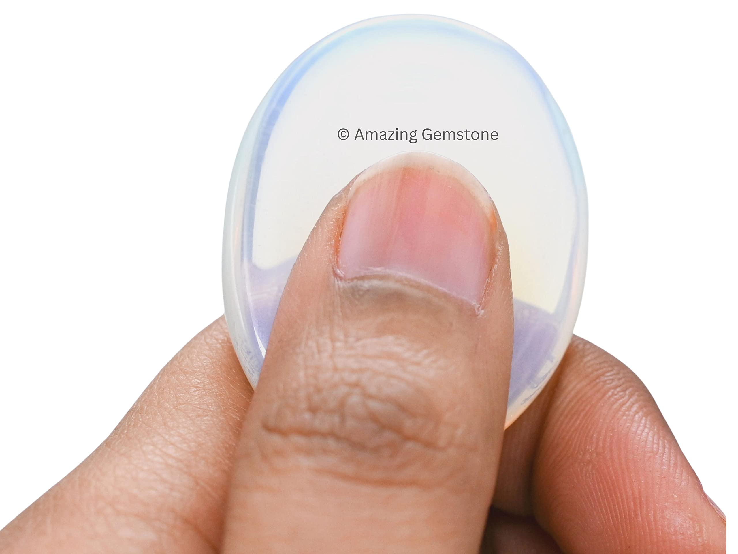 Amazing Gemstone Opalite worry stone on desk as a stress relief tool.