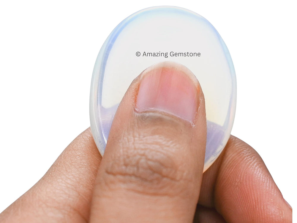 Amazing Gemstone Opalite worry stone on desk as a stress relief tool.