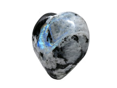 Amazing Gemstone Rainbow Moonstone heart palm stone resting on a velvet pouch display