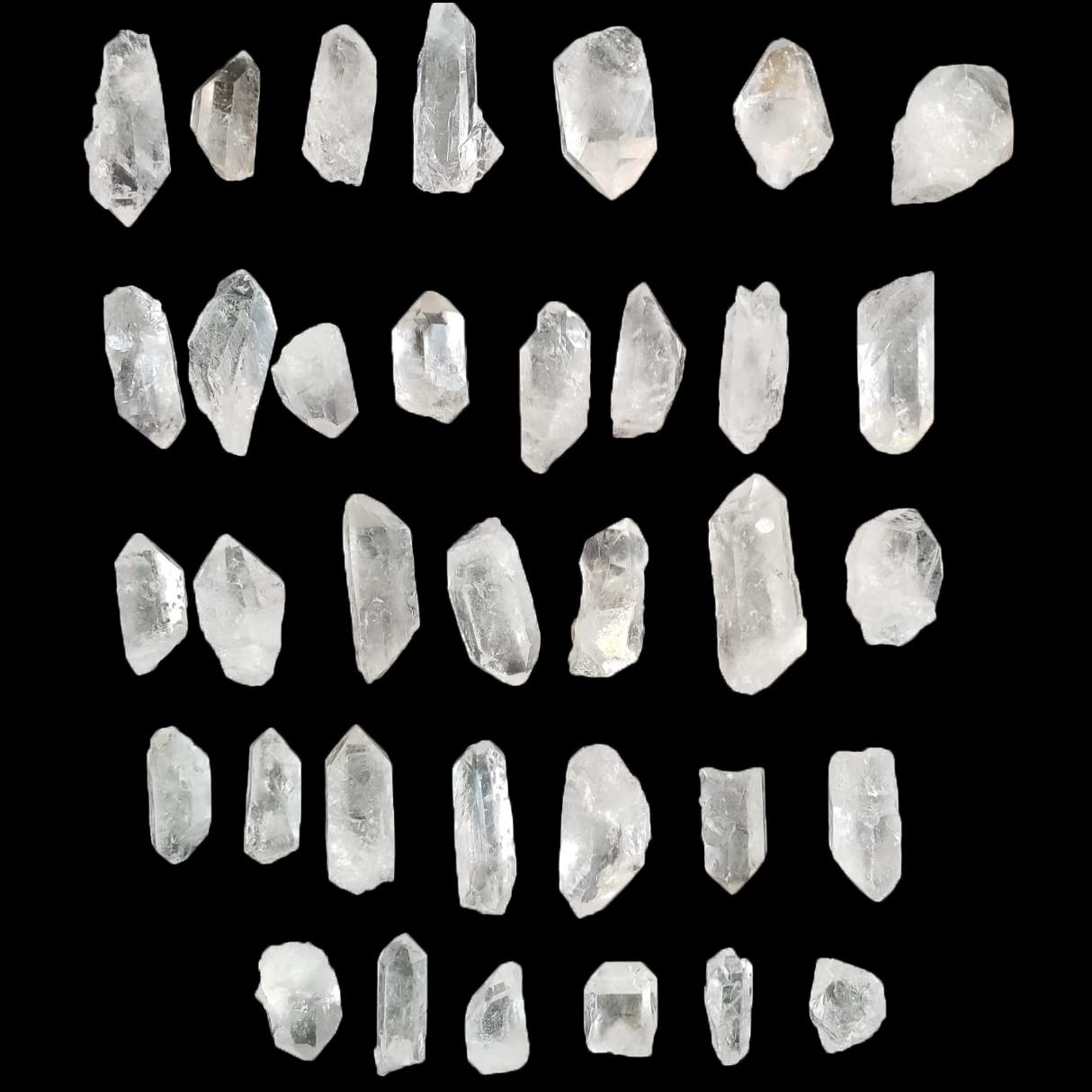 AMOYSTONE rough clear quartz pieces showcase natural variations ideal for display.