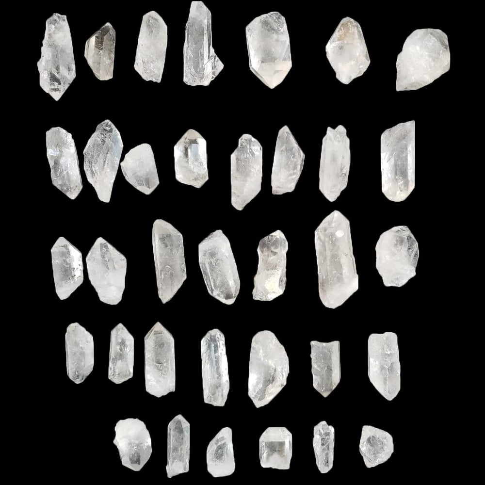 AMOYSTONE rough clear quartz pieces showcase natural variations ideal for display.