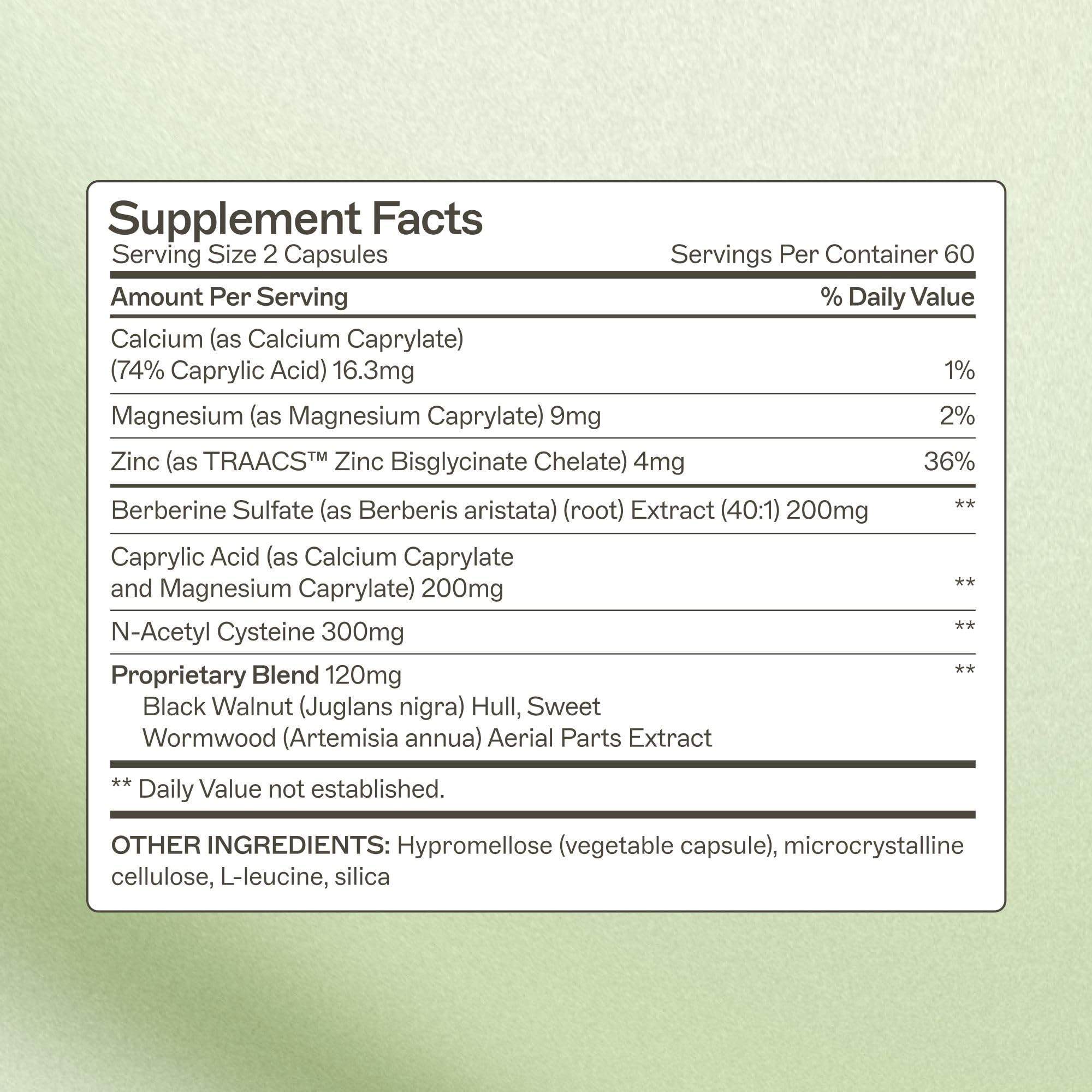 Capsules being dispensed from Amy Myers MD Microb-Clear container for daily use