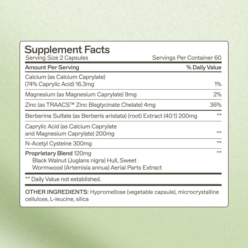 Capsules being dispensed from Amy Myers MD Microb-Clear container for daily use
