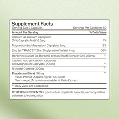 Capsules being dispensed from Amy Myers MD Microb-Clear container for daily use