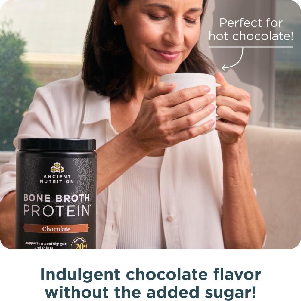 Ancient Nutrition measuring scoop beside powder for easy portions.
