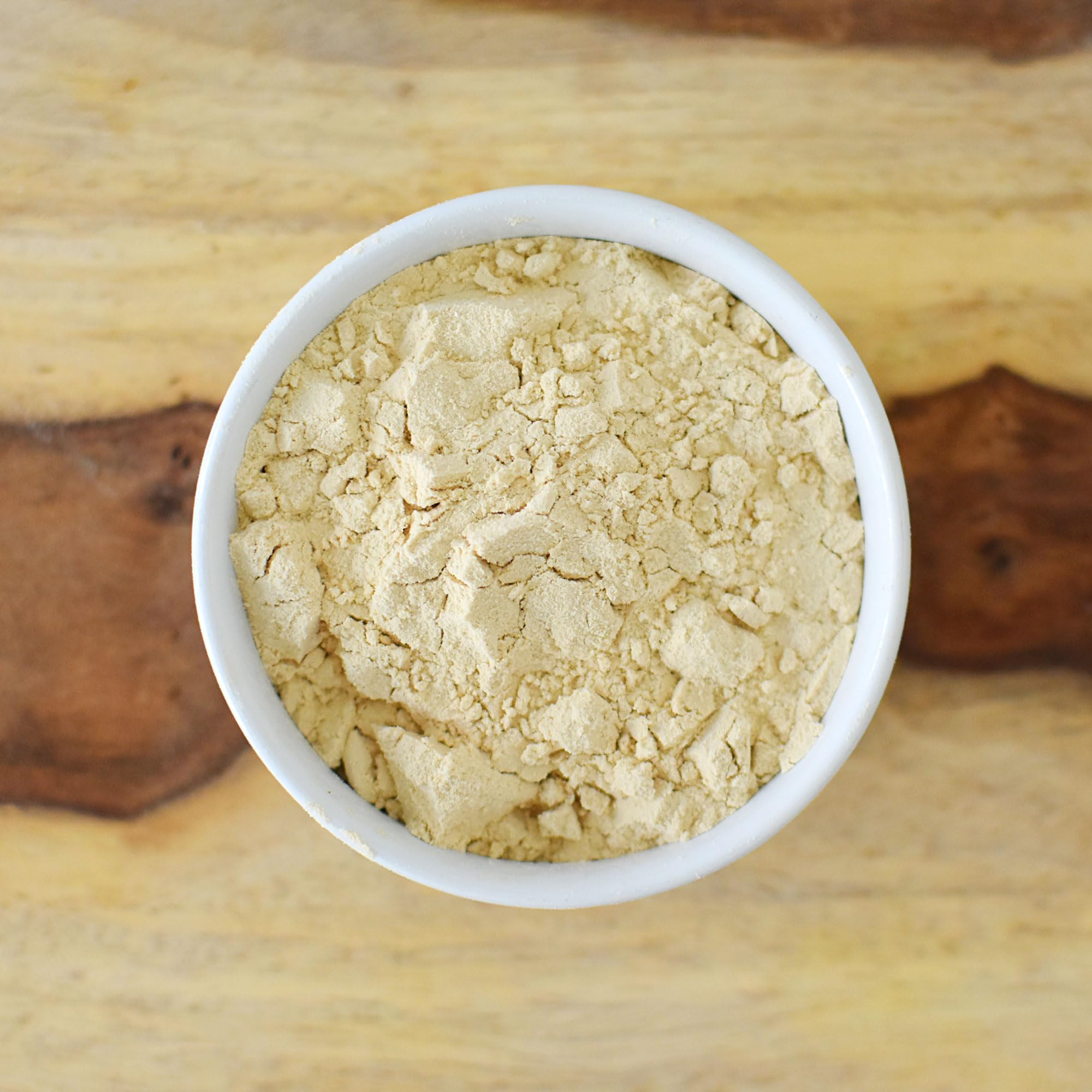 Anthony's Premium Pea Protein stirred into yogurt for a protein-boosted snack.