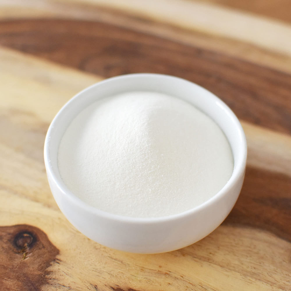 Anthony's Collagen Peptide Powder on kitchen counter next to ingredients.