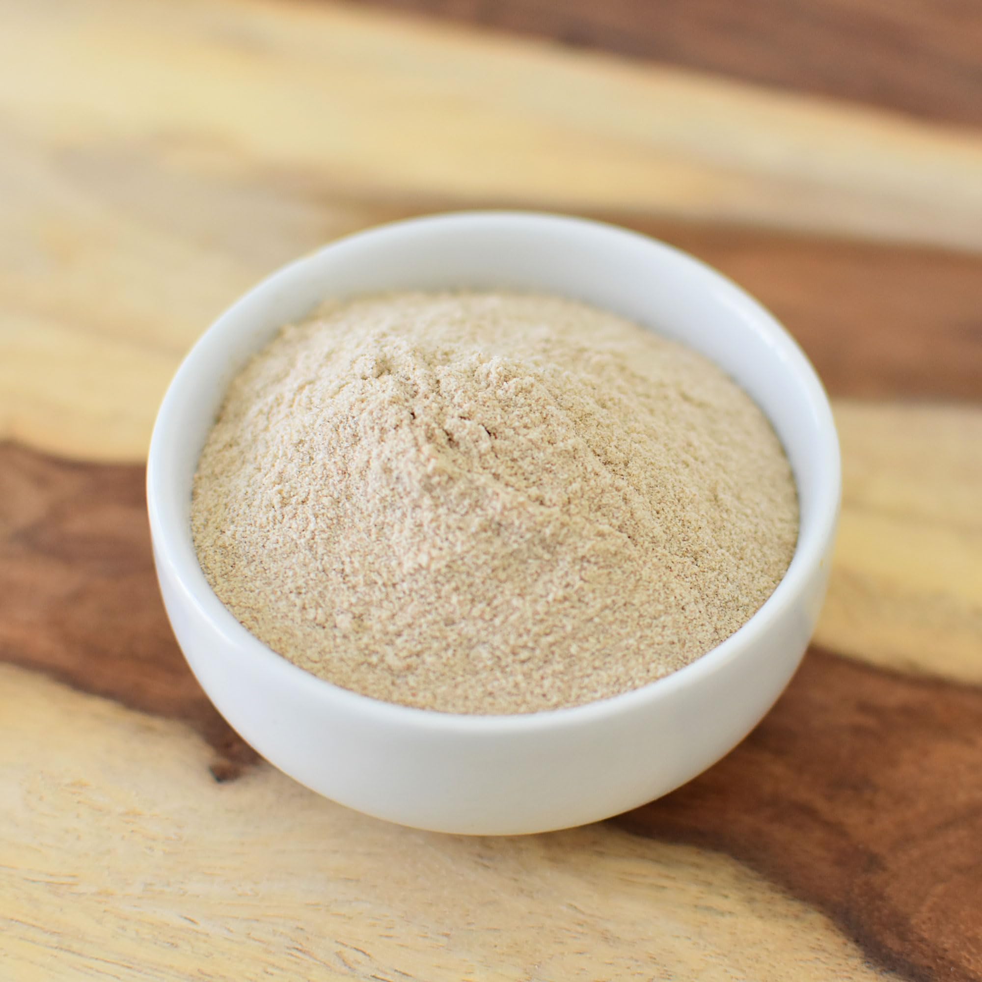 Anthony's psyllium husk powder in glass, ready for a fiber-rich drink.