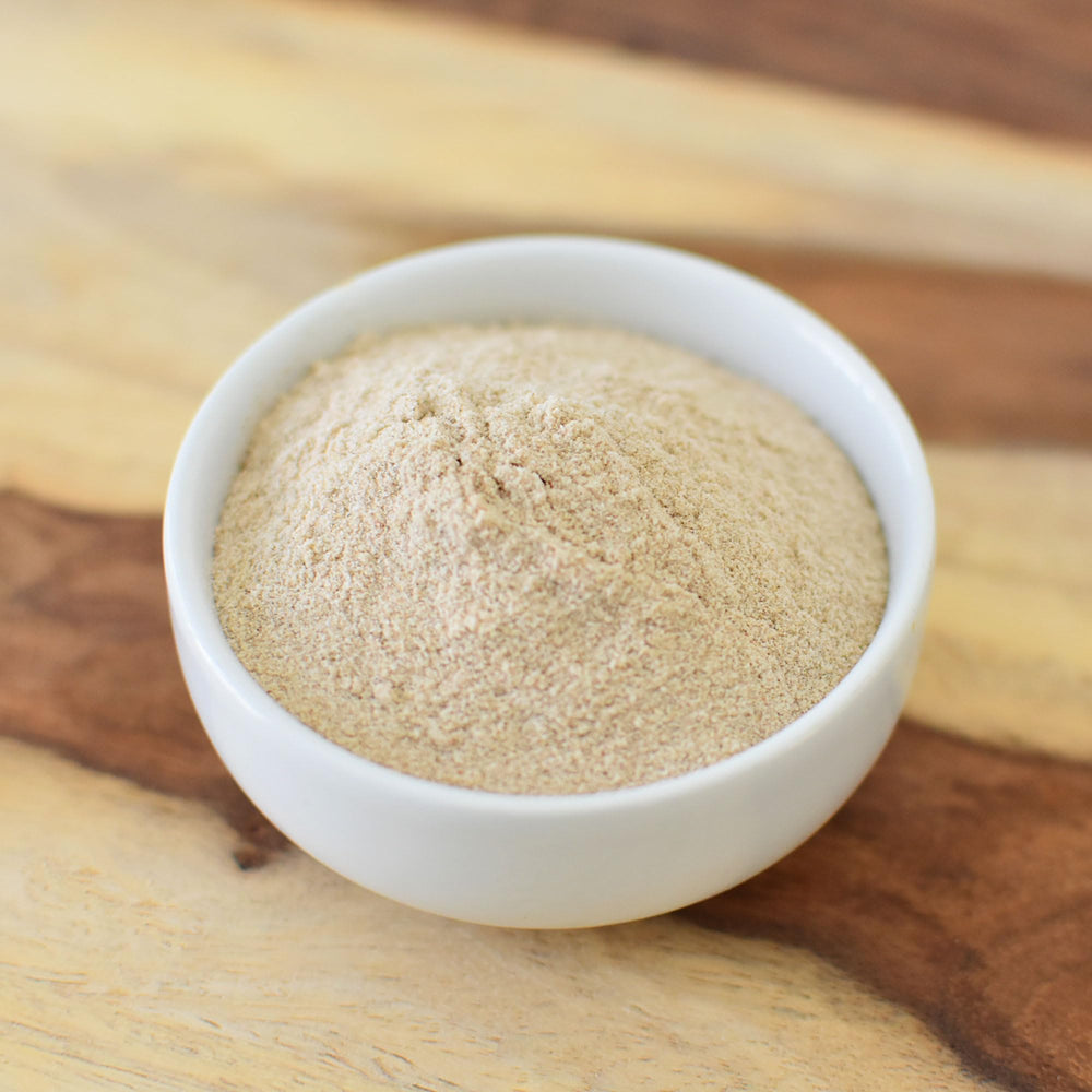 Anthony's psyllium husk powder in glass, ready for a fiber-rich drink.