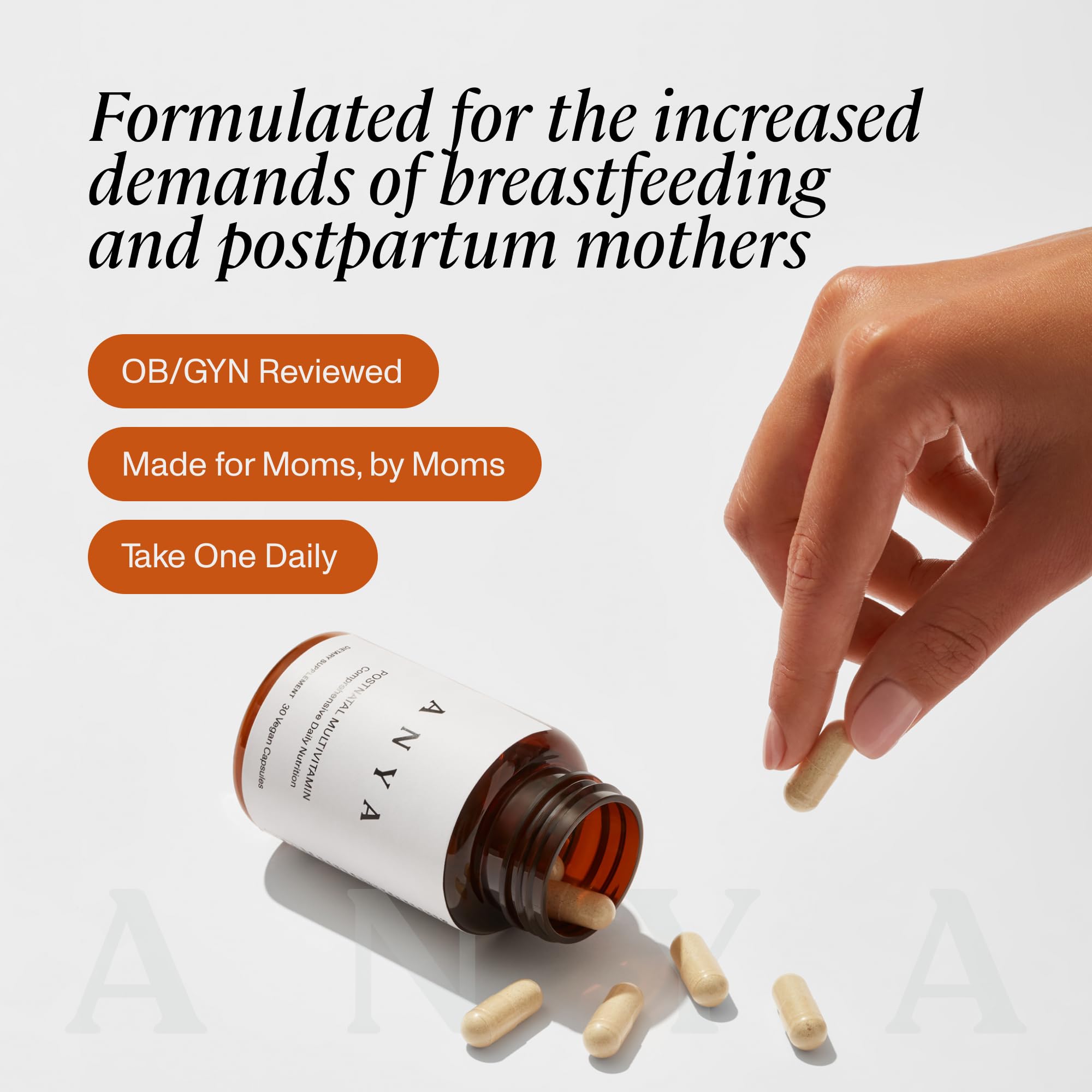 ANYA Postpartum Multivitamin mom taking a pill as part of daily routine.
