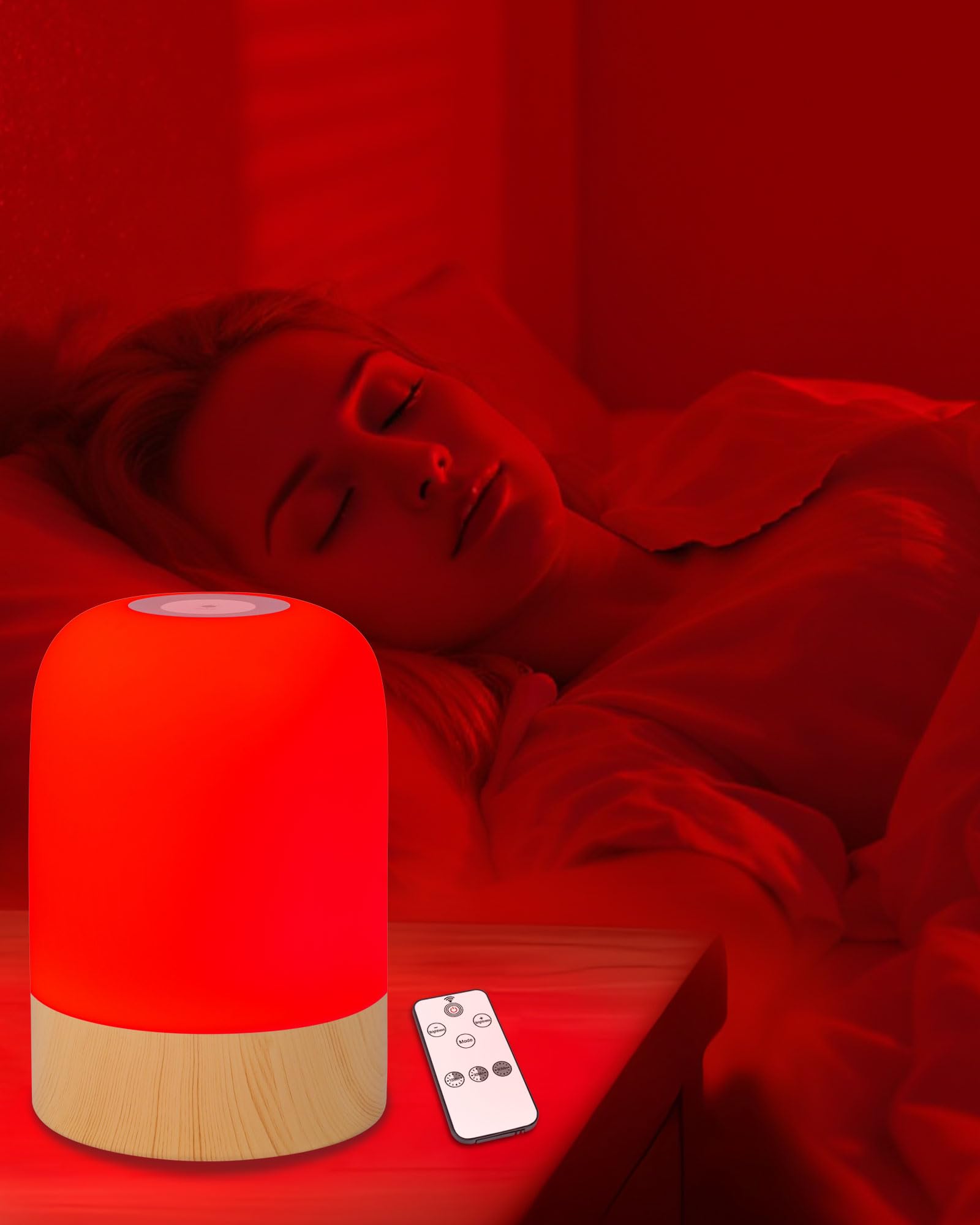 Aoife red light sleep lamp perched on the bedside table emits a calming glow.