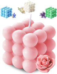 Candela de burbujas Aokala en cubo rosa, aroma floral suave para ambientar.