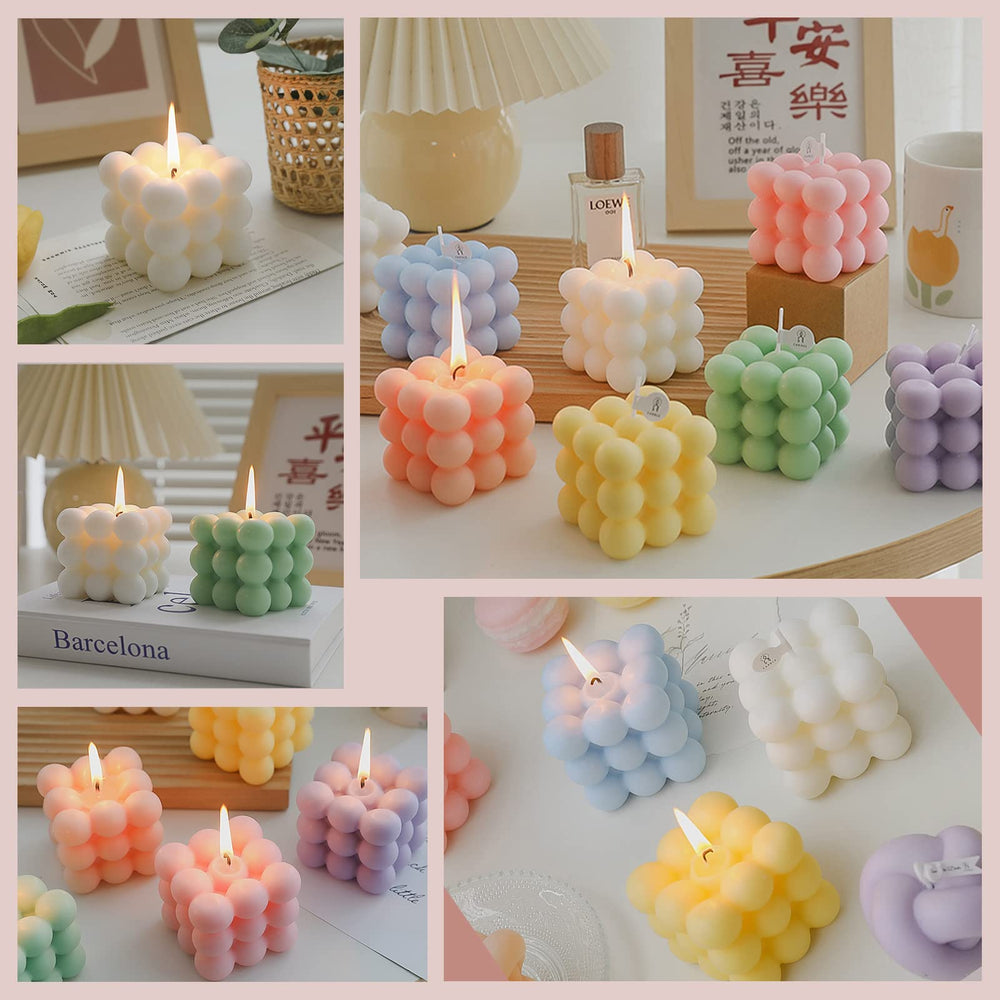 Composición decorativa de vela Aokala en tono rosa, añade estilo y aroma.