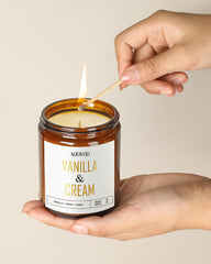 AOOVOO Vanilla Cream Candle wick glow warms a quiet evening.