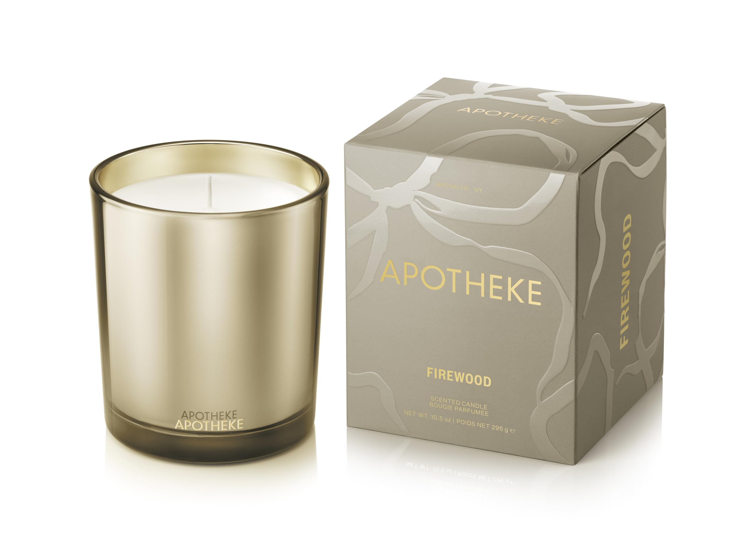 APOTHEKE Firewood candle in a brown jar for warm, lasting home fragrance.