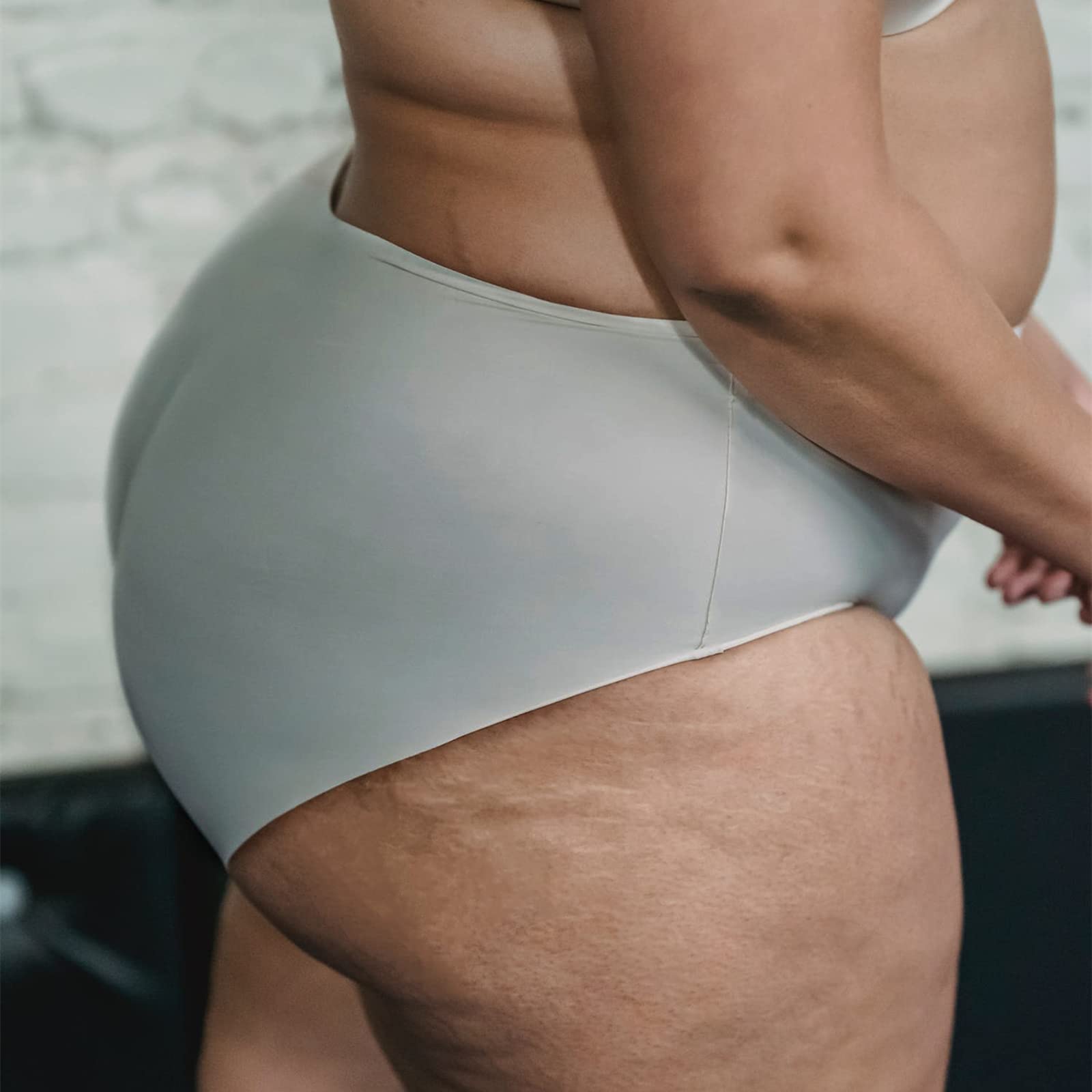 AQX translucent ultra-thin diaper cover for nearly invisible protection.