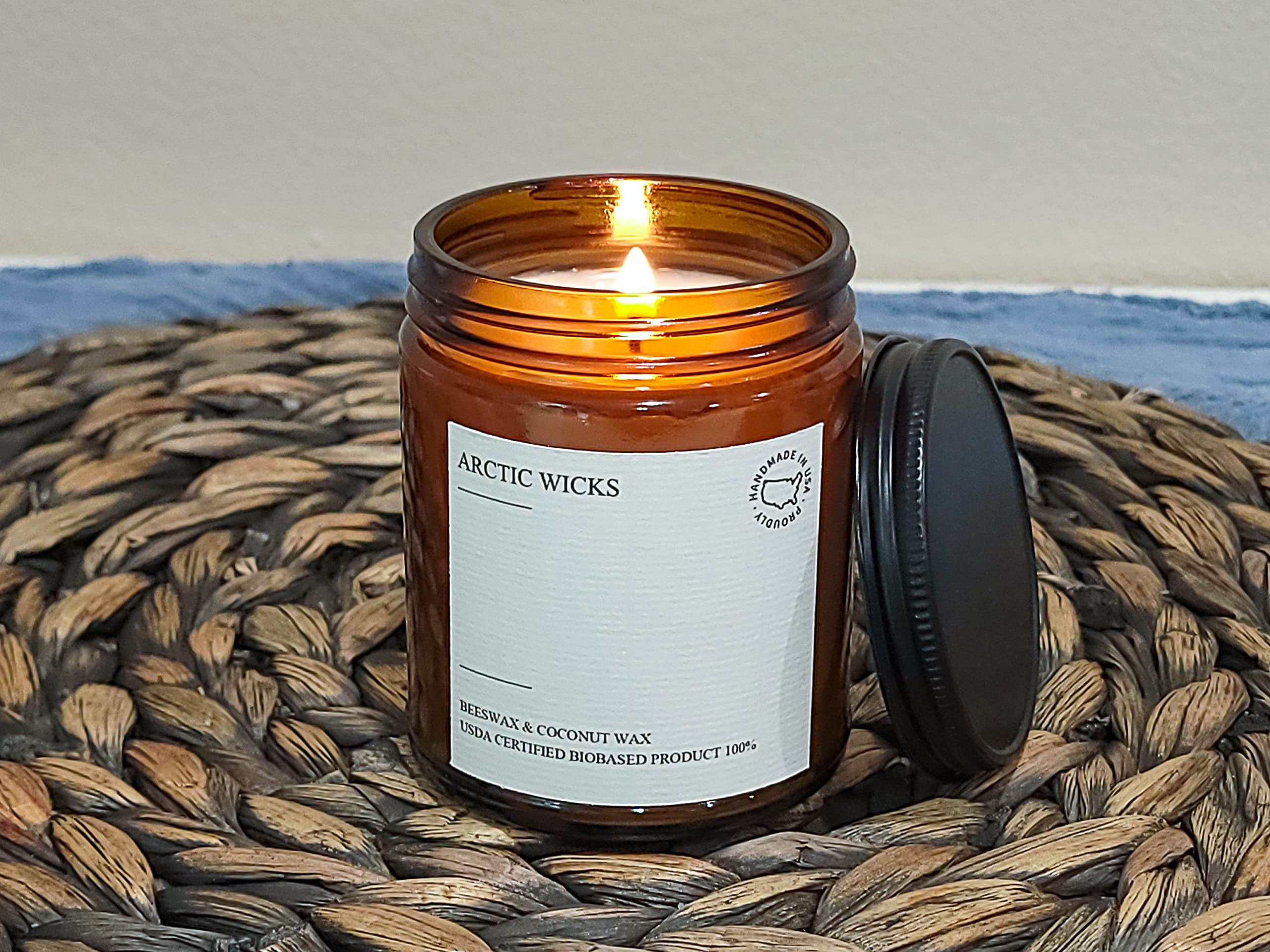 Arctic Wicks cedar and vanilla base notes suggested by the candle.