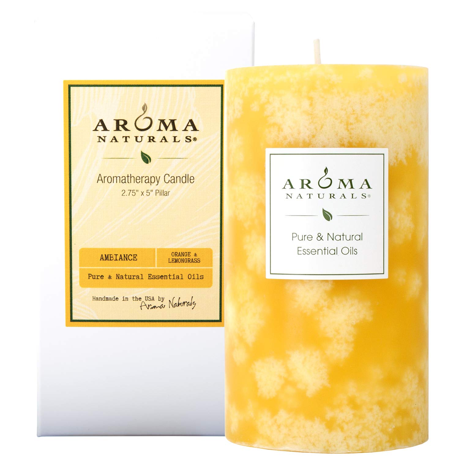 Aroma Naturals orange lemongrass pillar candle in yellow enhances ambiance with pure essential oils.