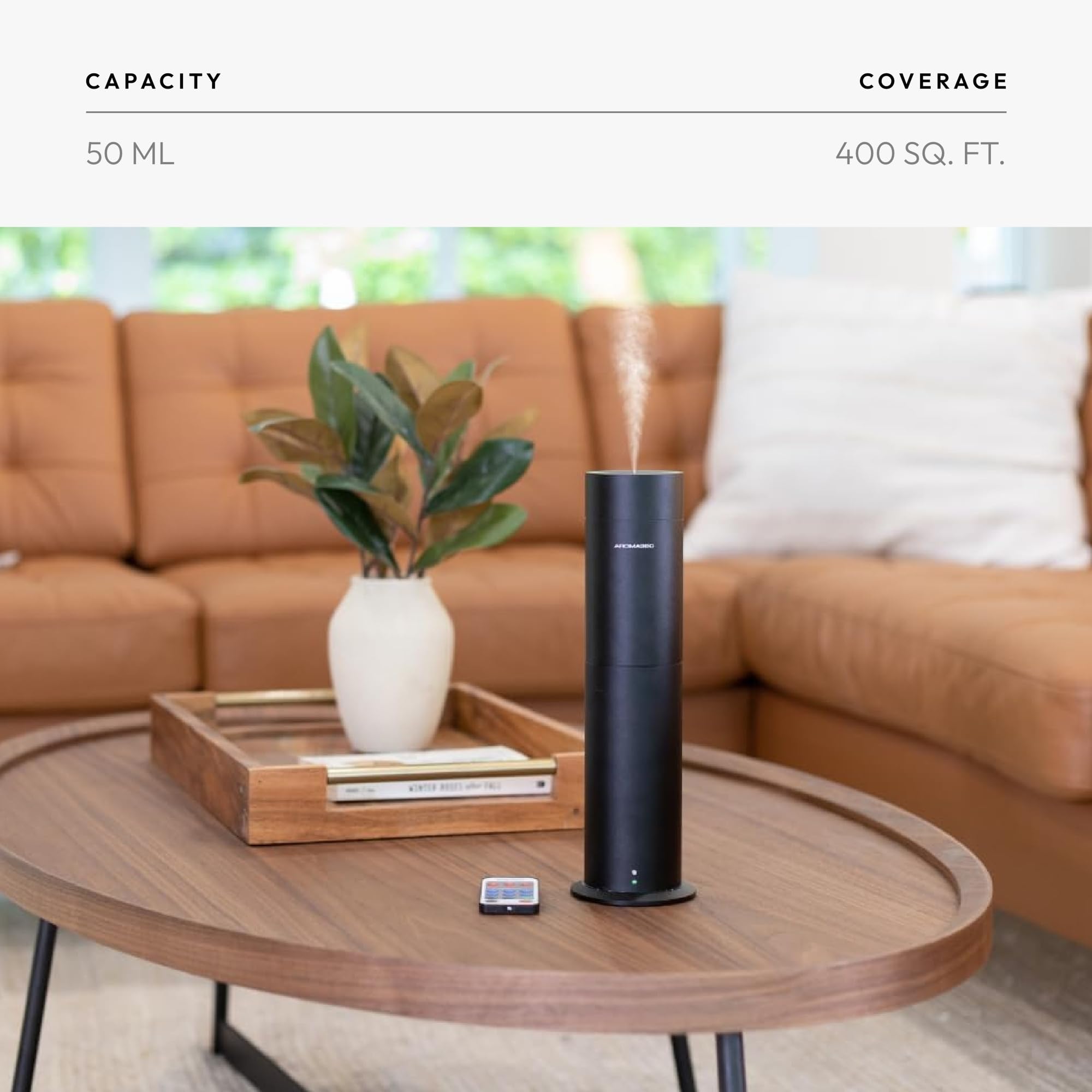 Aroma360 Mini Pro Diffuser in a living room illustrating 600 sq ft coverage