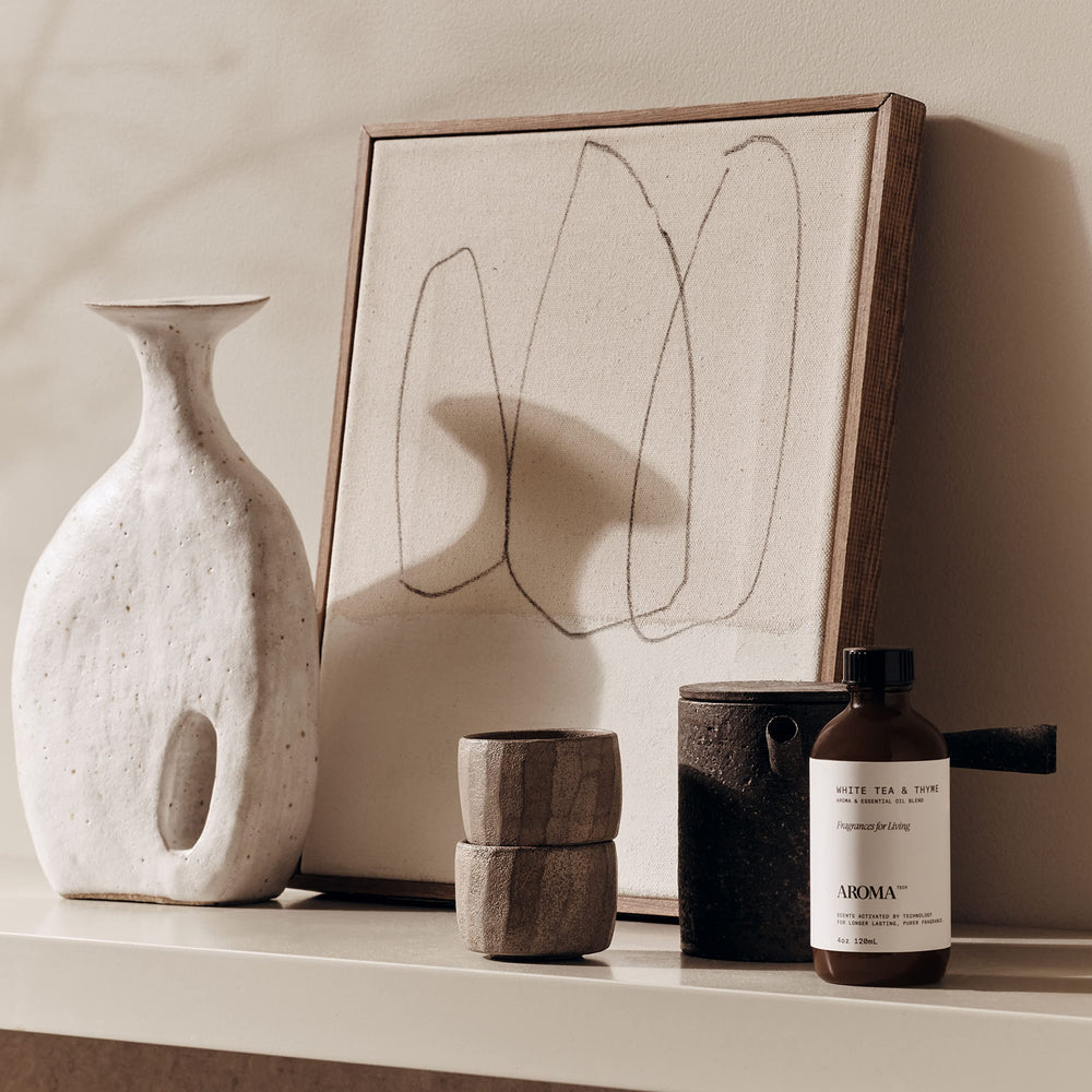 AromaTech Amber-White-Tea-Thyme bottle adds warm, soothing notes.