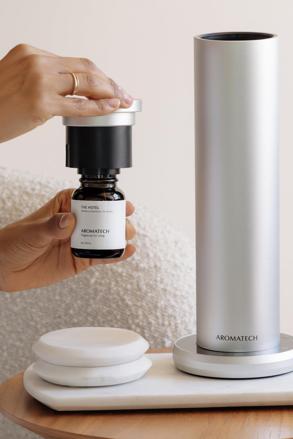Bluetooth icon next to AroMini BT Plus emphasizes wireless control features
