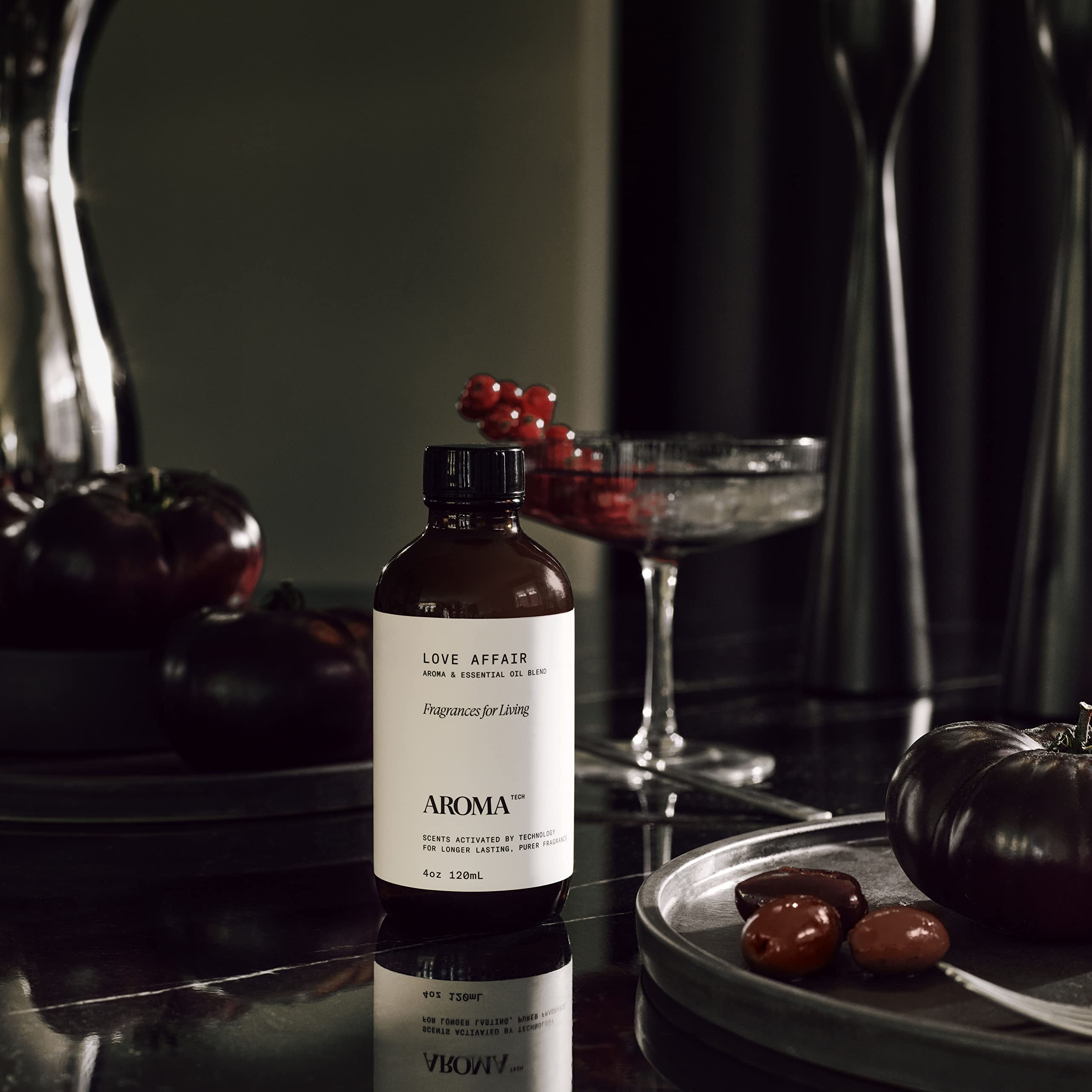AromaTech diffuser setup close-up demonstrates ready-to-diffuse oil blends.