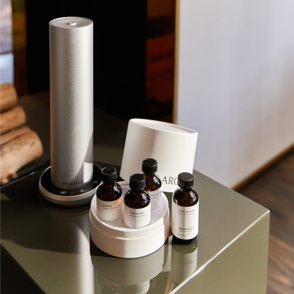 AromaTech Diffuser setup shown in a cozy living space.