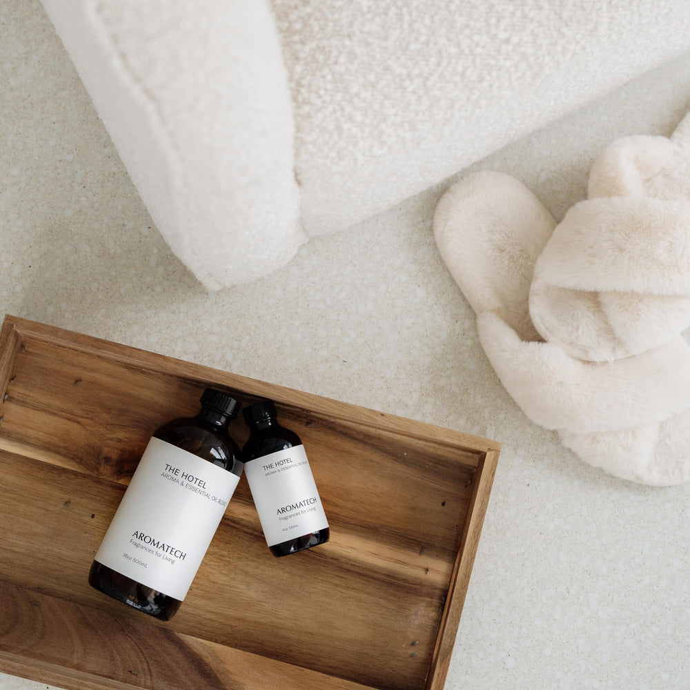 AromaTech The Hotel Premium Aroma Oil 60ml-label indicates compact size for diffusers.