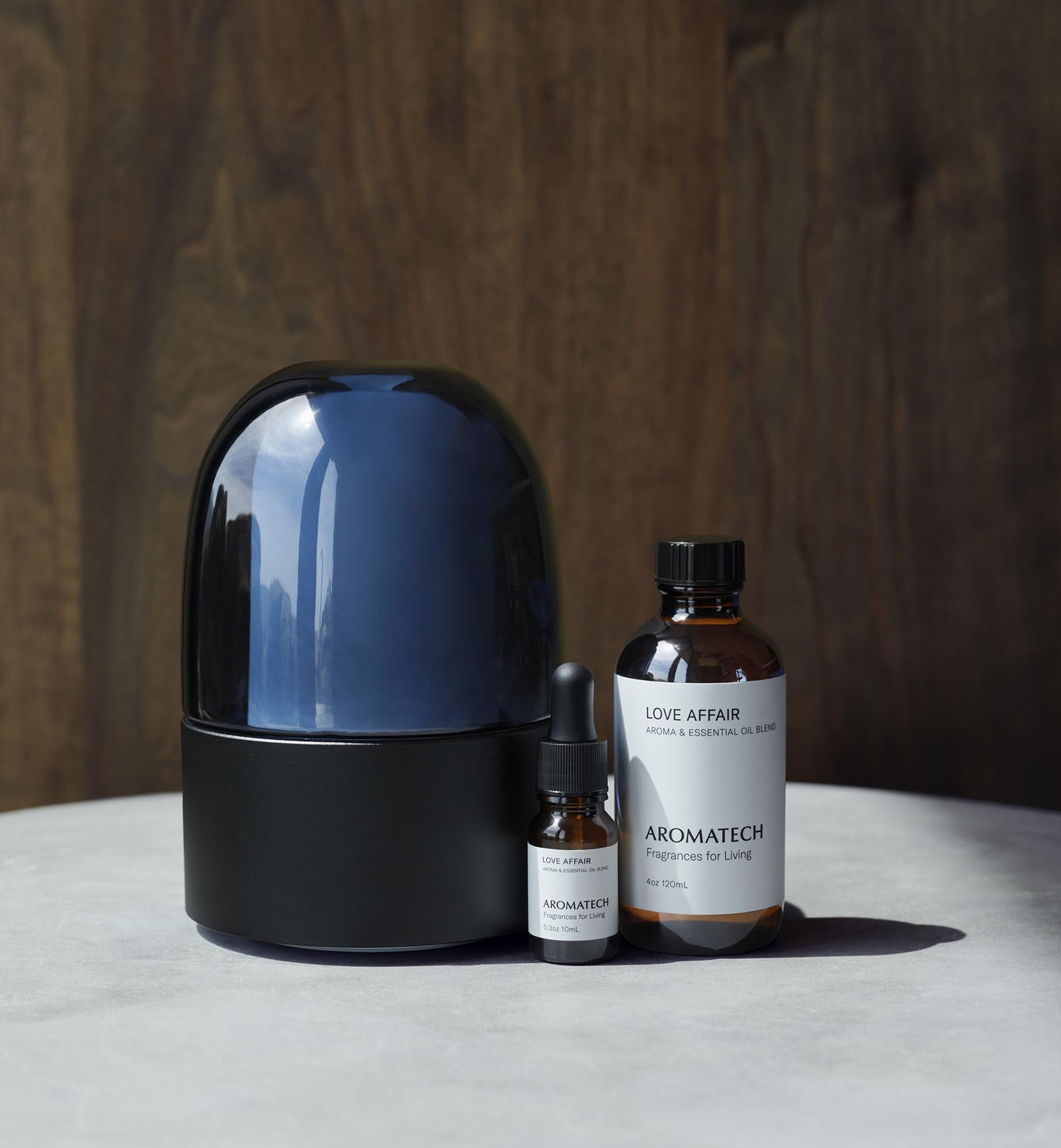 AromaTech Love Affair bottle pour demonstrates precise dosing for effortless diffusion.