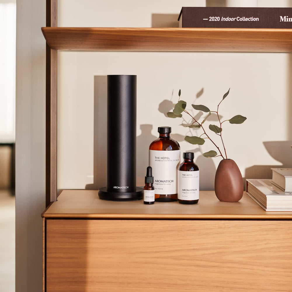 AromaTech The Hotel nightstand scene conveys hotel-inspired calm and elegance.