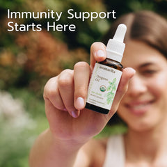 AROMAVITA oregano oil dropper scene, ready for convenient daily use.