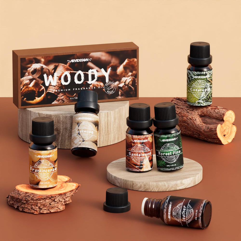 ARVIDSSON Woody Oils packaging shows amber bottles with euro droppers for precise use.