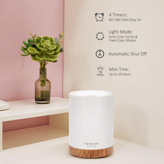 ASAKUKI diffuser in cozy room demonstrates humidification and calming ambience.