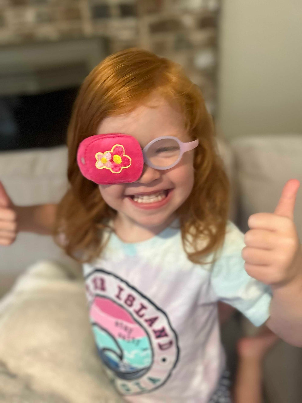Astropic blue ice cream eye patch packaging, playful design to engage children.
