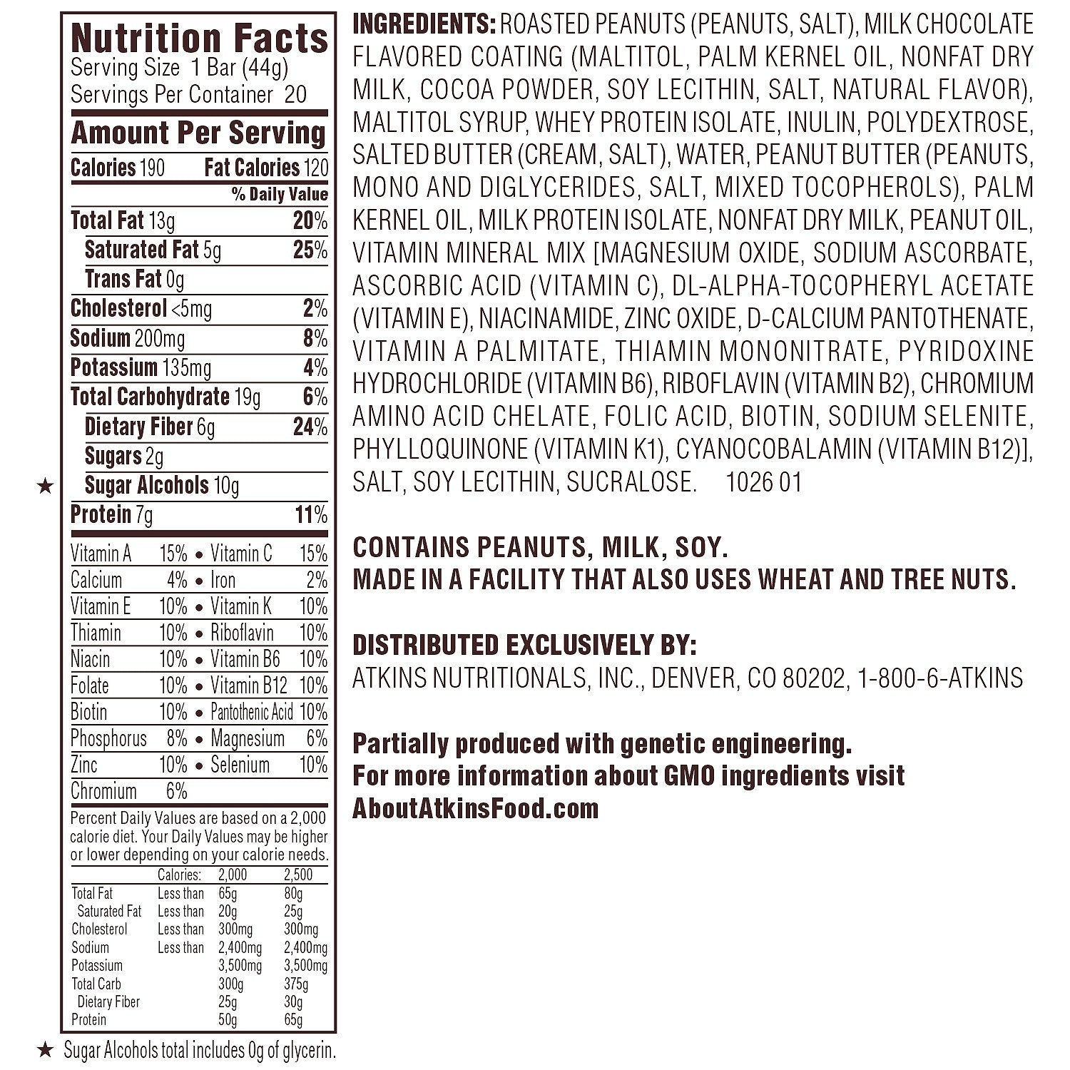 Atkins Caramel Chocolate Nut Roll bar cross-section, peanut nougat and caramel with chocolate coating, protein-rich.