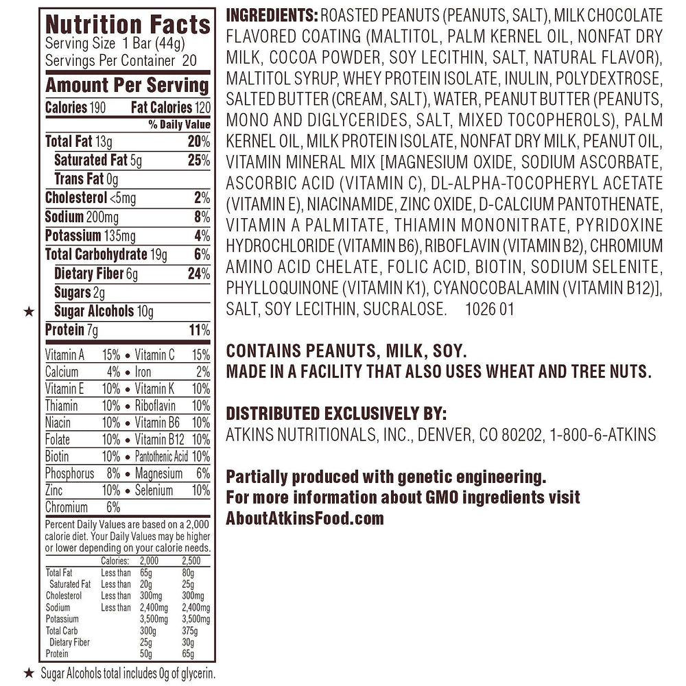 Atkins Caramel Chocolate Nut Roll bar cross-section, peanut nougat and caramel with chocolate coating, protein-rich.