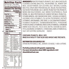 Atkins Caramel Chocolate Nut Roll bar cross-section, peanut nougat and caramel with chocolate coating, protein-rich.