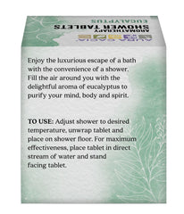 Aura Cacia Purifying Eucalyptus Shower Tablet dissolving in a steam-filled shower