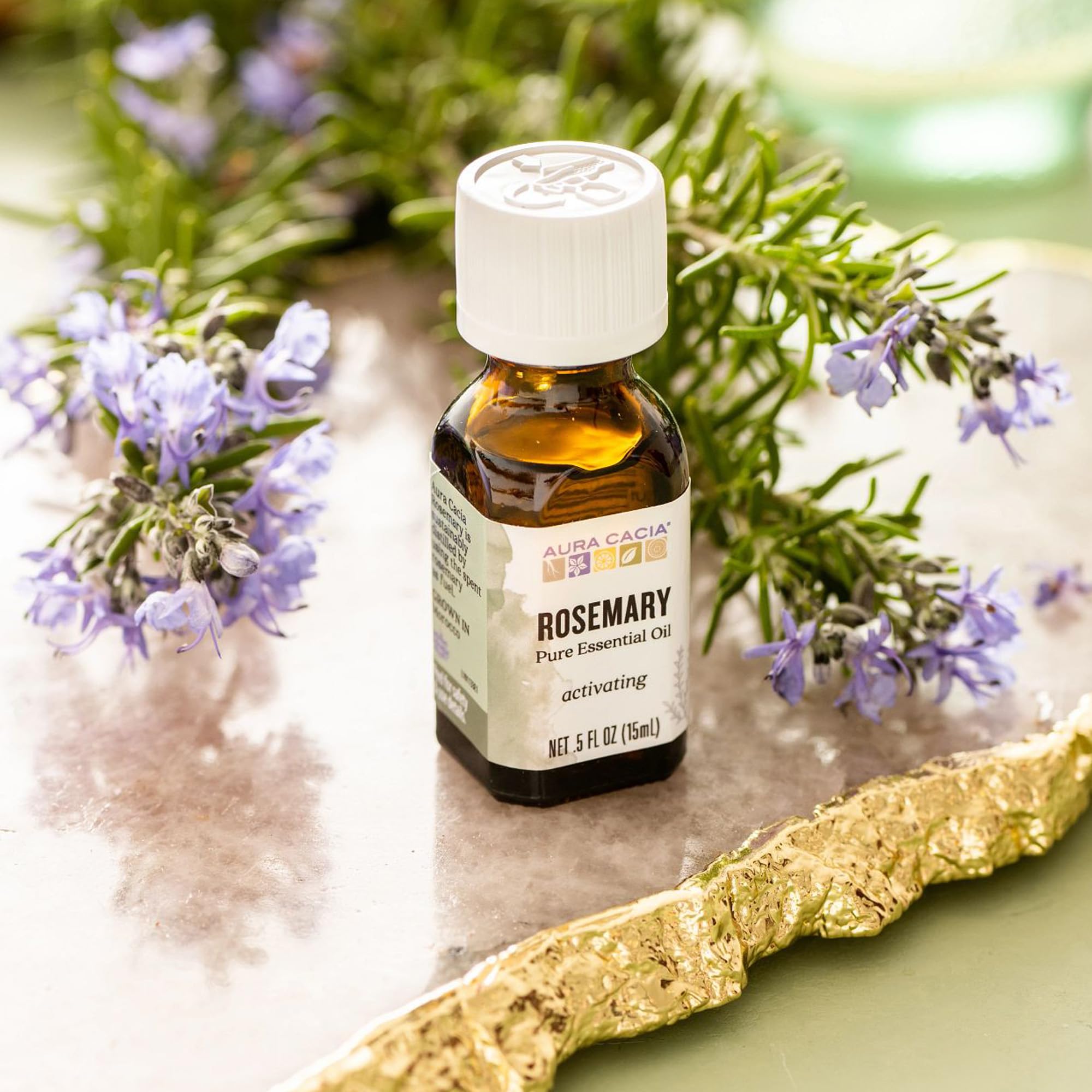 Aura Cacia Rosemary Essential Oil skincare application for refreshing skincare routines.