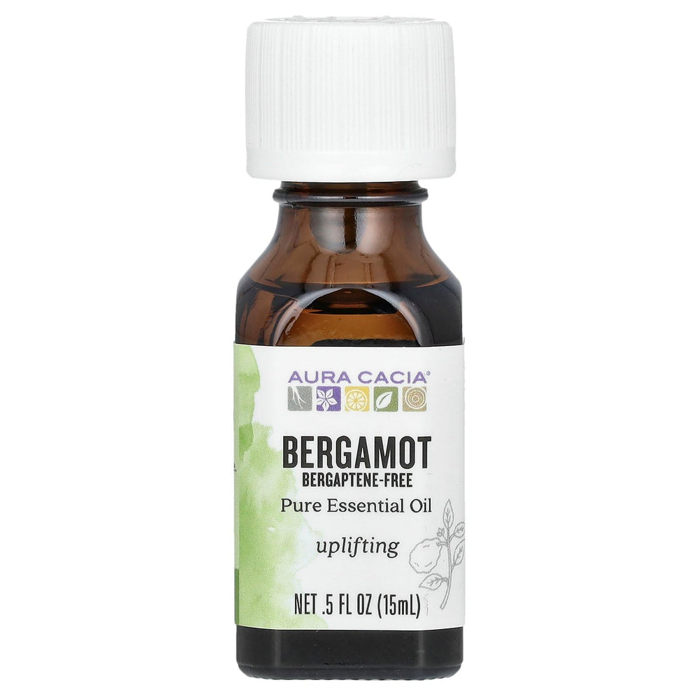 Aura Cacia Bergamot oil bottle pour for uplifting diffusers and DIY blends.