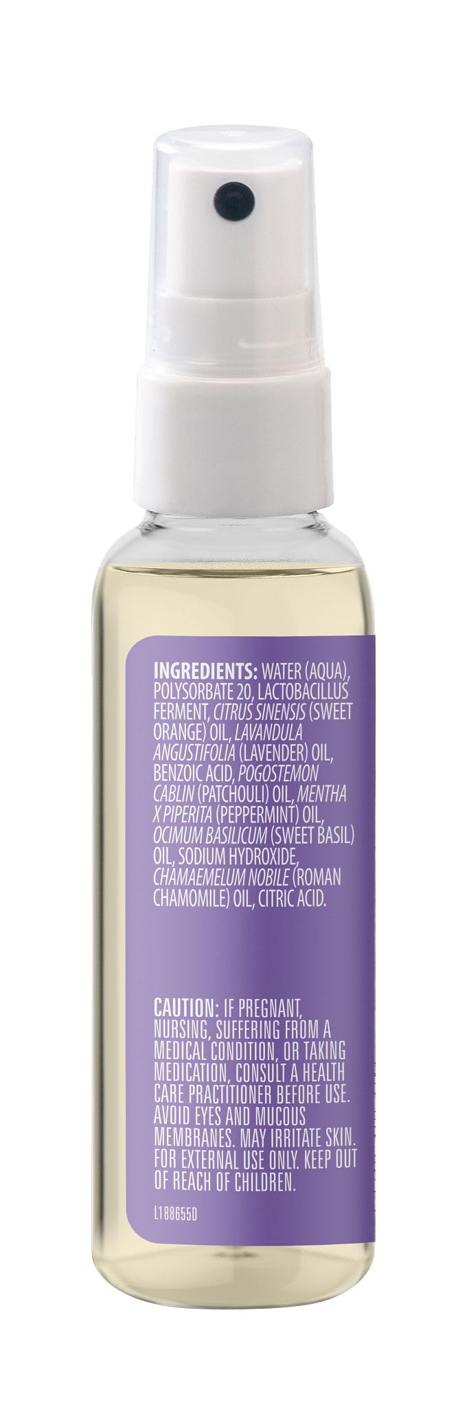 Aura Cacia Chill Pill Mist patchouli bottle promotes earthy mood enhancement during work.