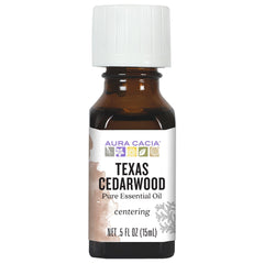 Aura Cacia Texas Cedarwood oil for diffuser aromatherapy, grounding ambiance.