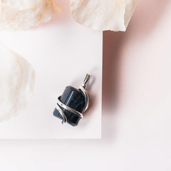 Ayana Wellness black tourmaline crystal closeup highlighting energy purification.