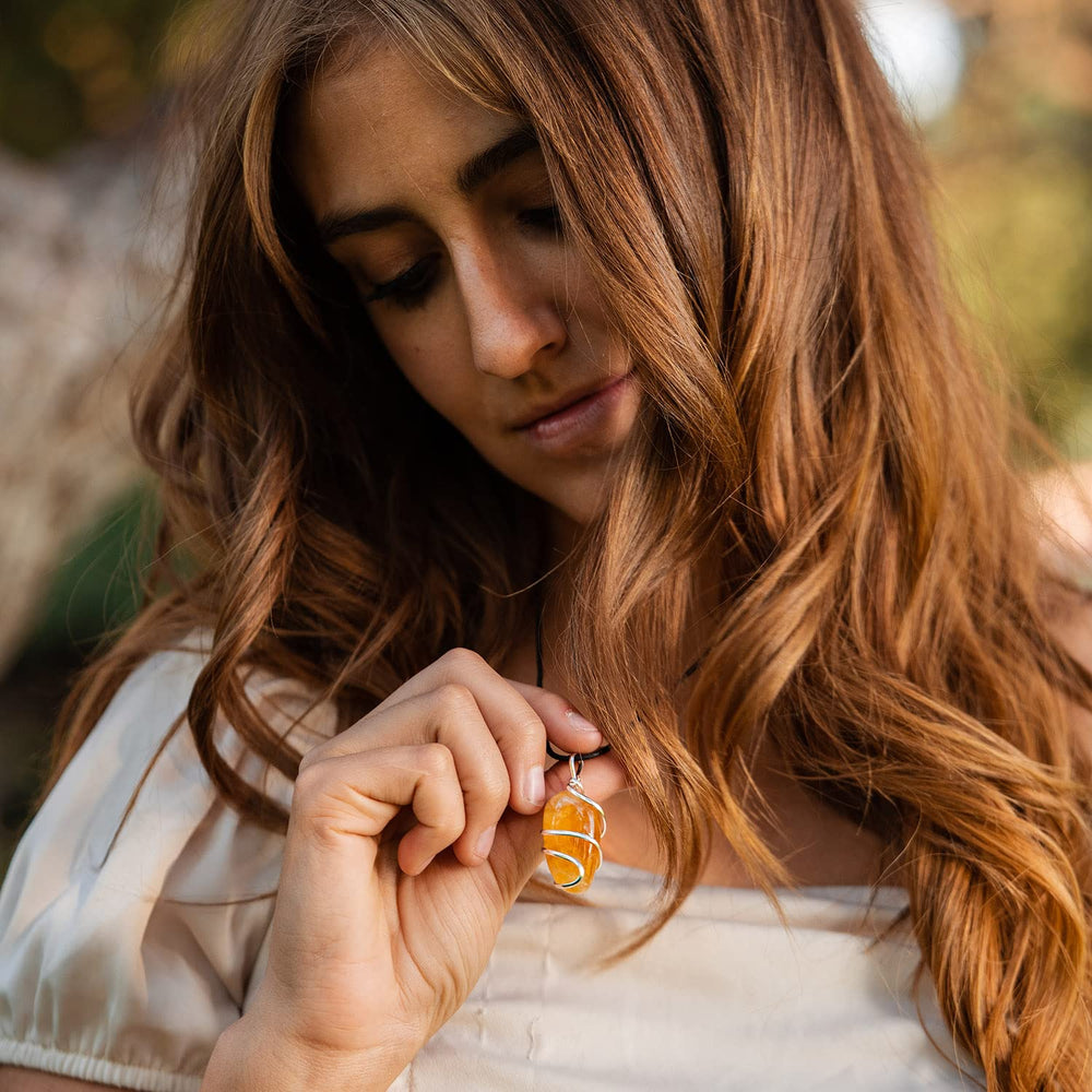 Ayana Wellness Citrine pendant natural setting emphasizes authentic craftsmanship and glow.
